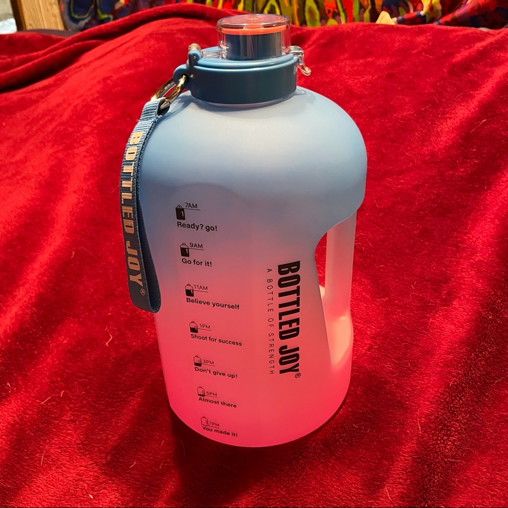 Bottled Joy 1-Gallon water bottle. BRAND NEW.